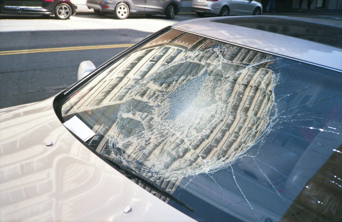 white broken car